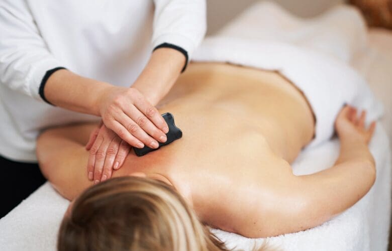 gua sha back and neck pain healing points acupuncture near me dr. michelle iona wellness center riverhead acupuncturist